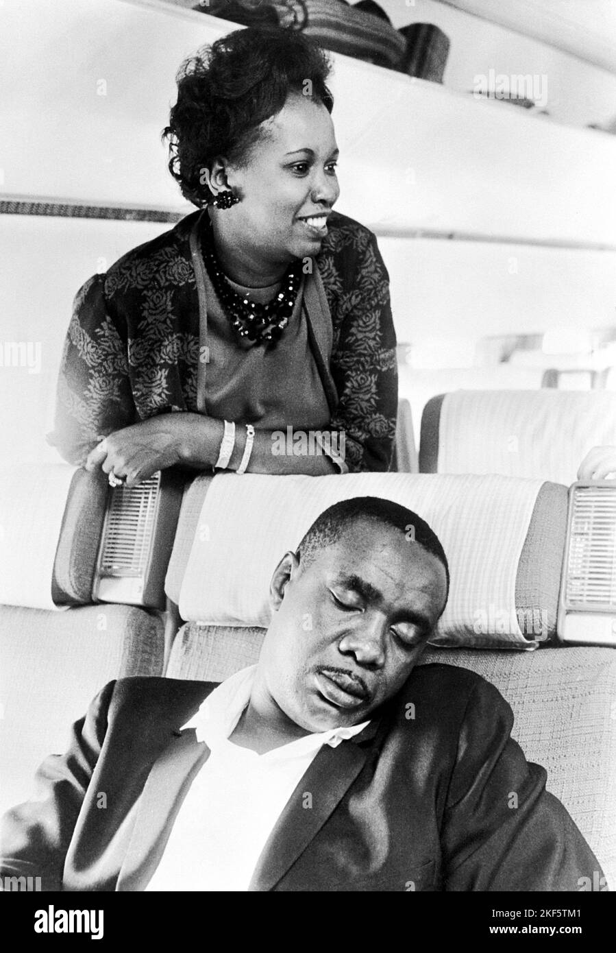 World Heavyweight Champion Sonny Liston remains sleeping in his seat