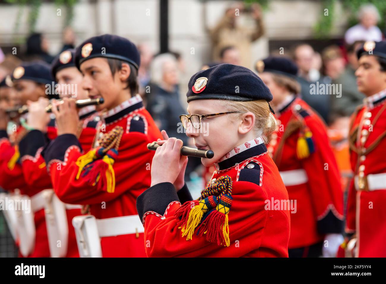 St Dunstan’s College Combined Cadet Force marching band at the Lord Mayor's Show parade in the City of London, UK. Young female flutist Stock Photo