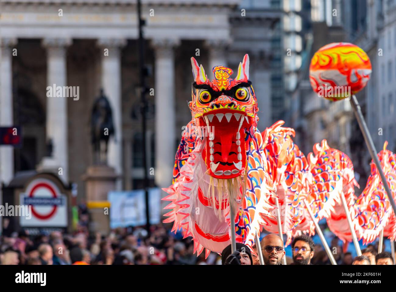 Hong Kong Economic and Trade Office dragon dancers at the Lord Mayor's Show parade in the City of London, UK. Dragon puppet Stock Photo