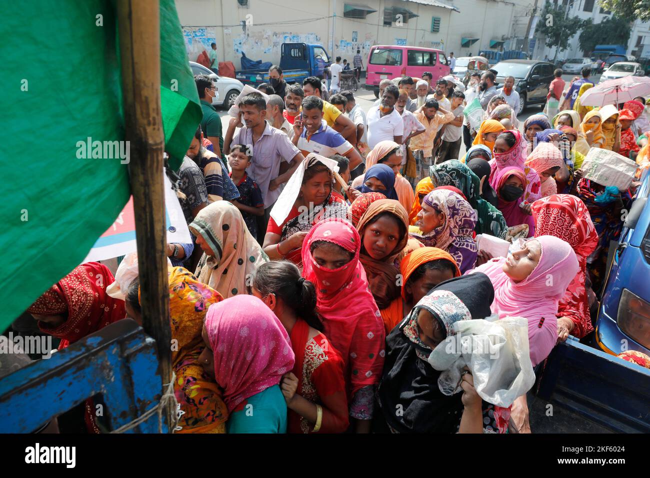 Dhaka, Bangladesh November 16, 2022 Long line of common people to