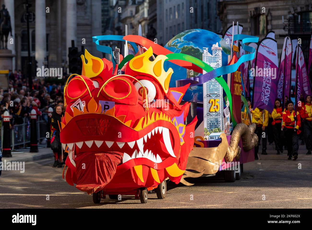 Hong Kong Economic and Trade Office dragon dancers at the Lord Mayor's Show parade in the City of London, UK. Dragon puppet Stock Photo