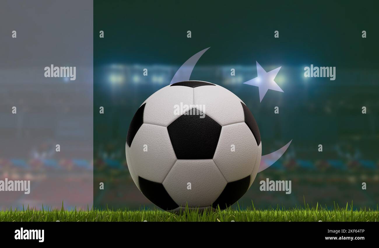 Soccer football ball on a grass pitch in front of stadium lights and