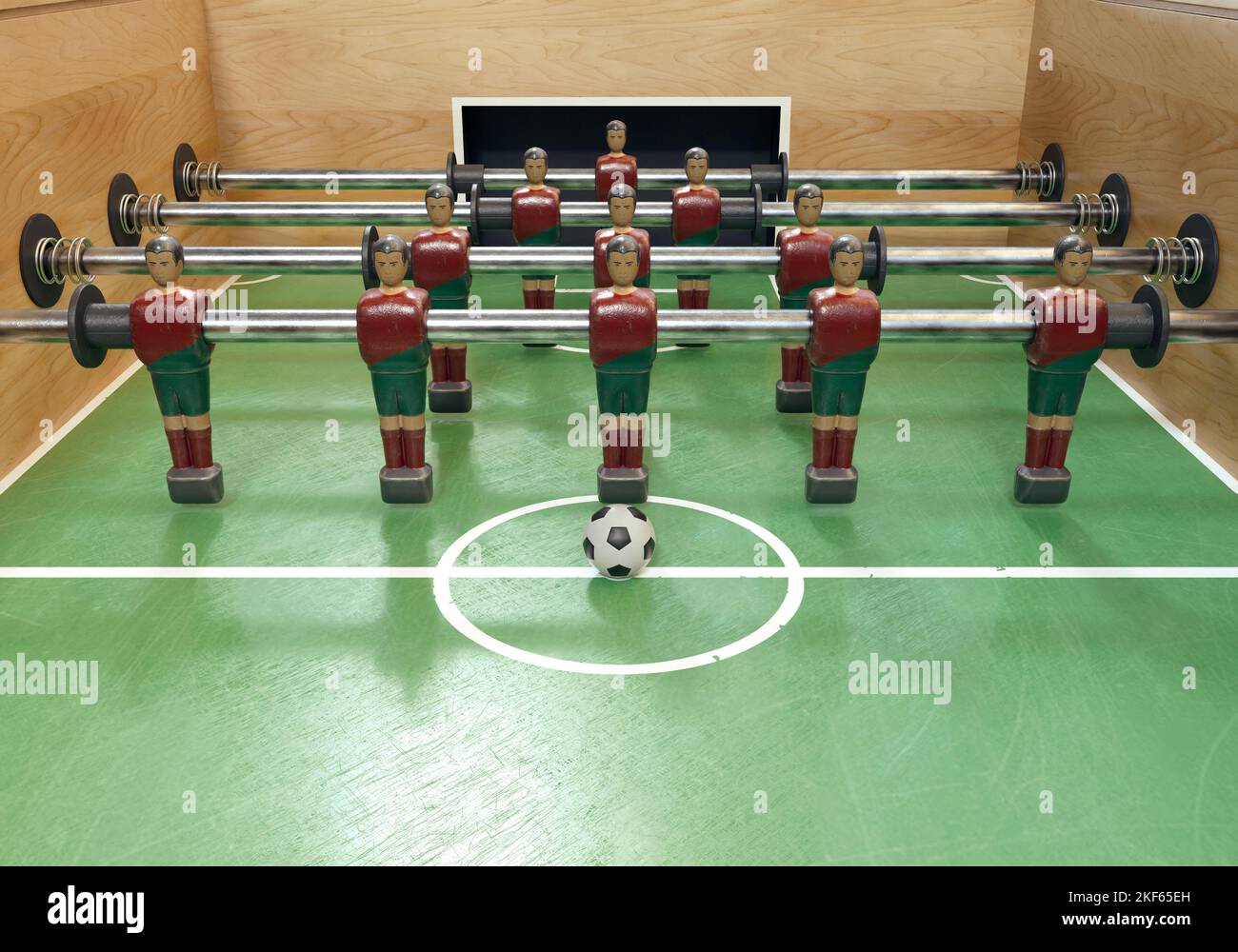One side of a vintage foosball or table football table with worn metal