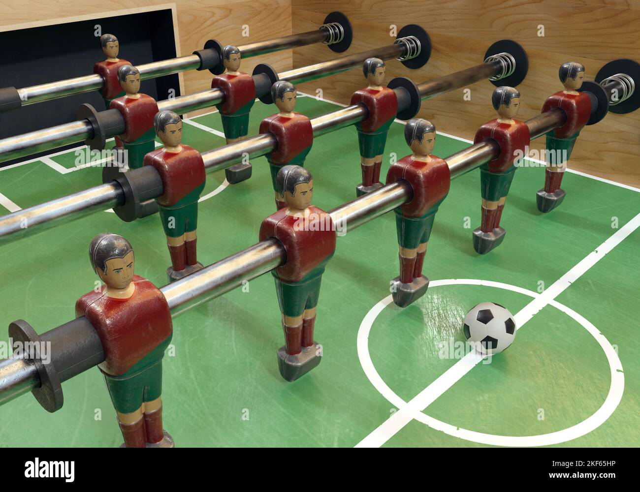 One side of a vintage foosball or table football table with worn metal