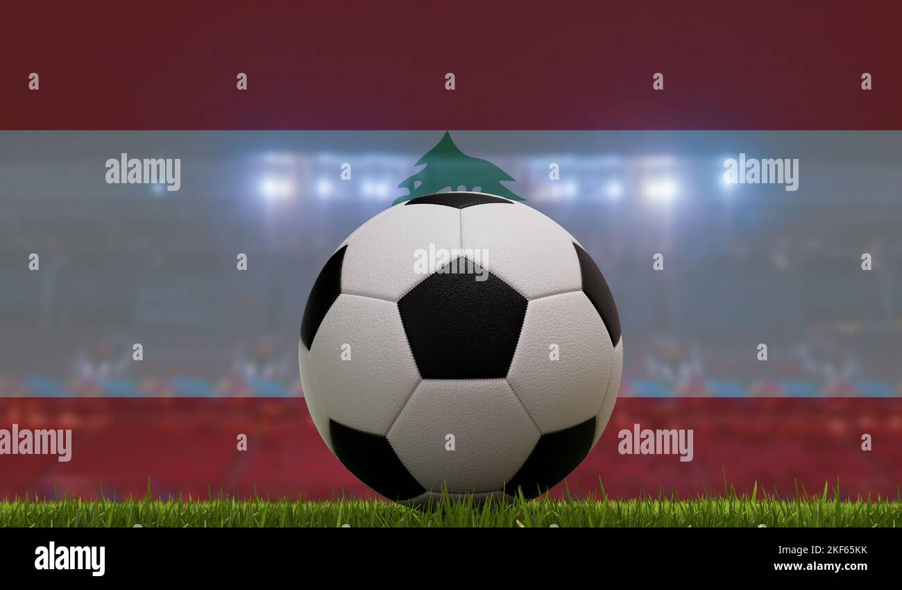 Soccer football ball on a grass pitch in front of stadium lights and