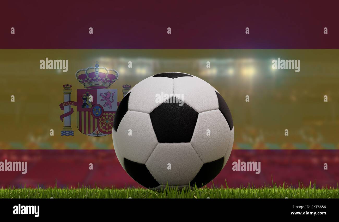 Soccer football ball on a grass pitch in front of stadium lights and