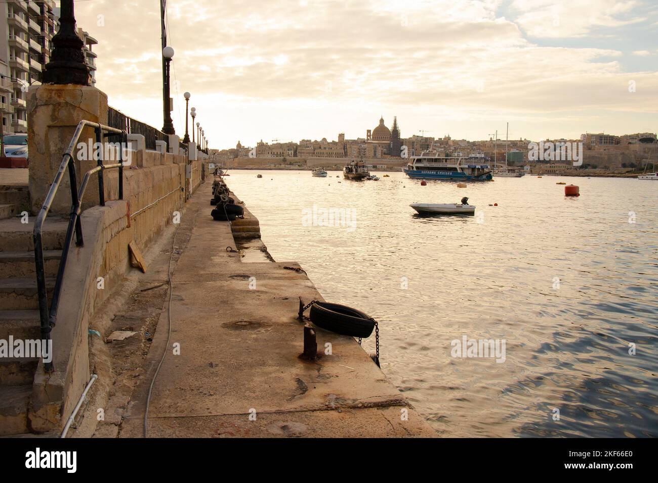 Sliema, Malta - November 12, 2022: Dock in Sliema with a view to Valletta waterfront Stock Photo