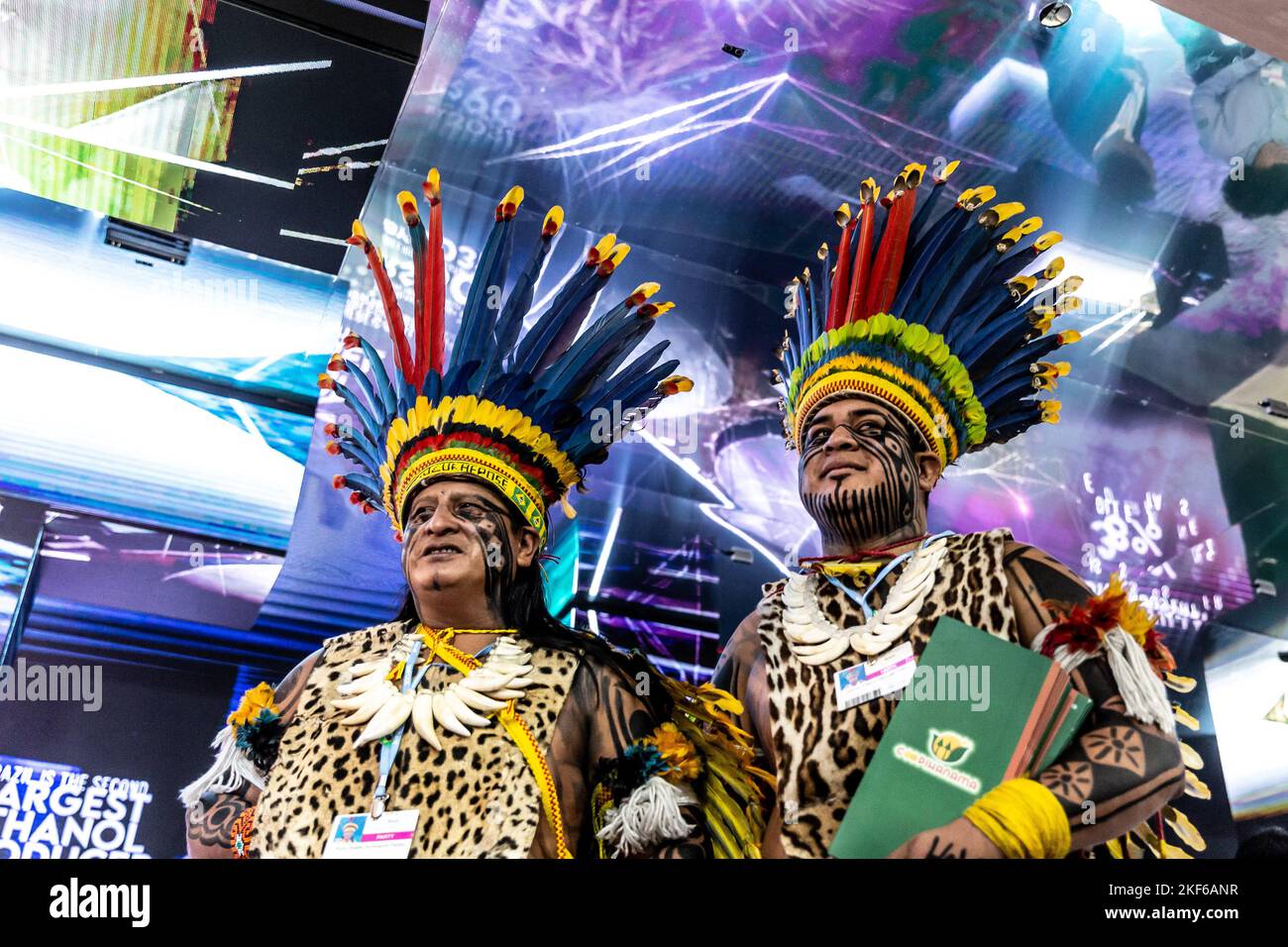 American Indigenous men stand in Brasilian Pavilion during the COP27 UN ...