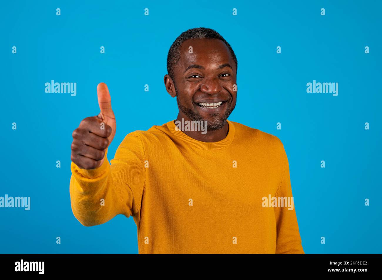 African american man showing thumb hi-res stock photography and images ...