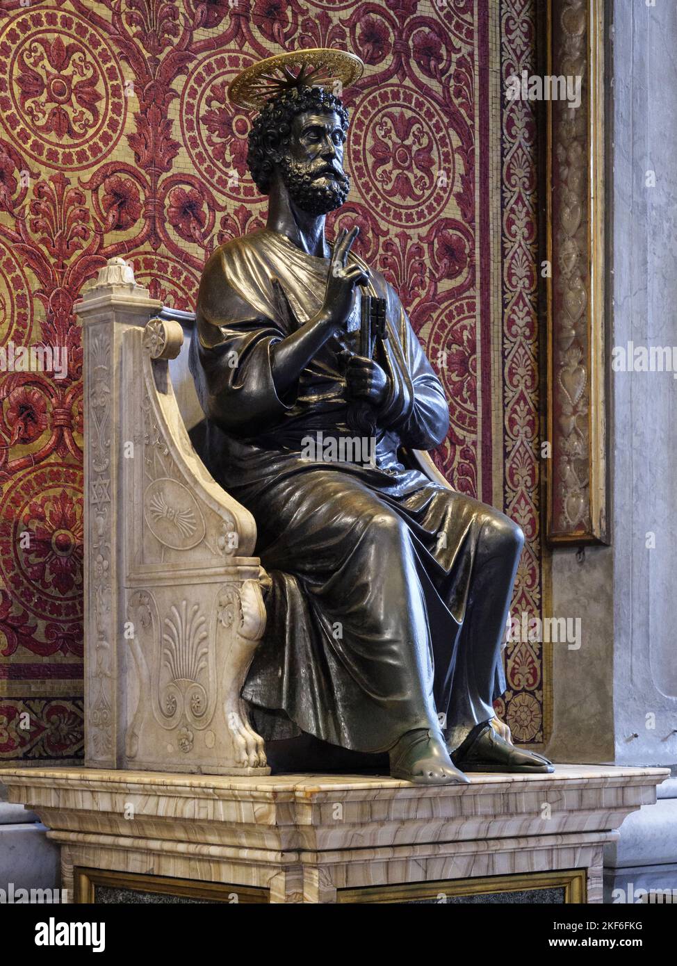 Rome. Italy. Basilica San Pietro (St. Peter’s Basilica). The bronze statue of Saint Peter holding the keys of heaven, attributed to Arnolfo di Cambio. Stock Photo