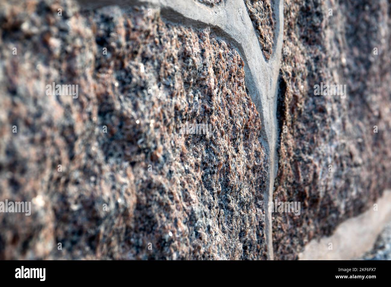 Masonry stone wall. Gray textured background. Construction. Stock Photo
