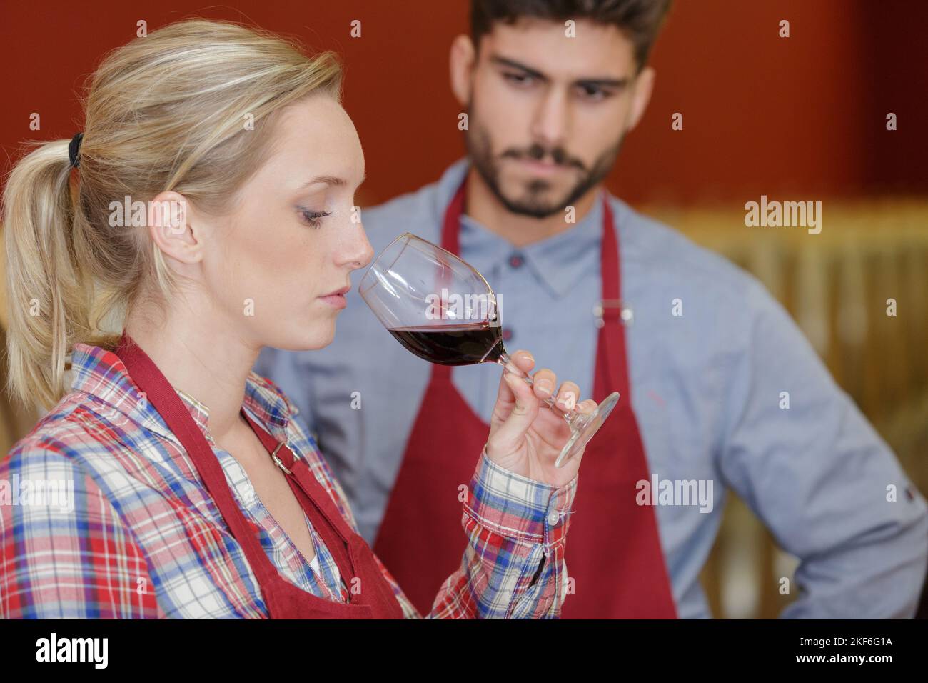 female wine aging worker tasting the product Stock Photo Alamy