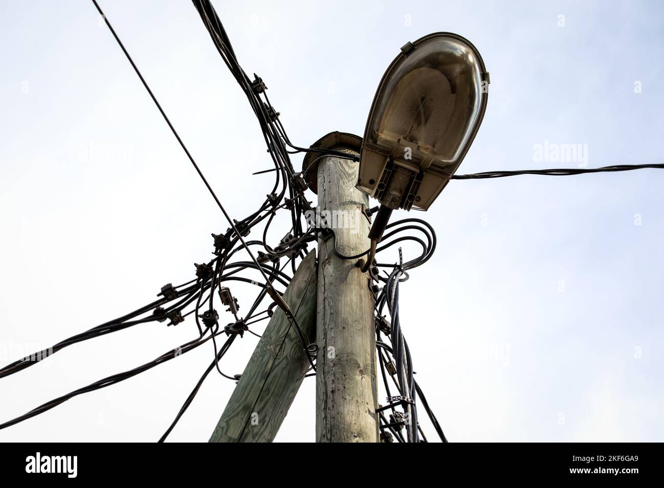 Street lighting on a pole. Electrical wires, cables and communications