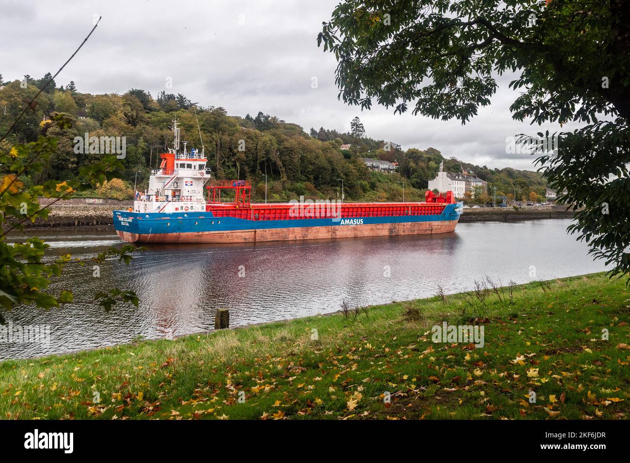 General cargo ship 'Eems Dollard' sails down the River Lee in Cork city, Ireland. Stock Photo