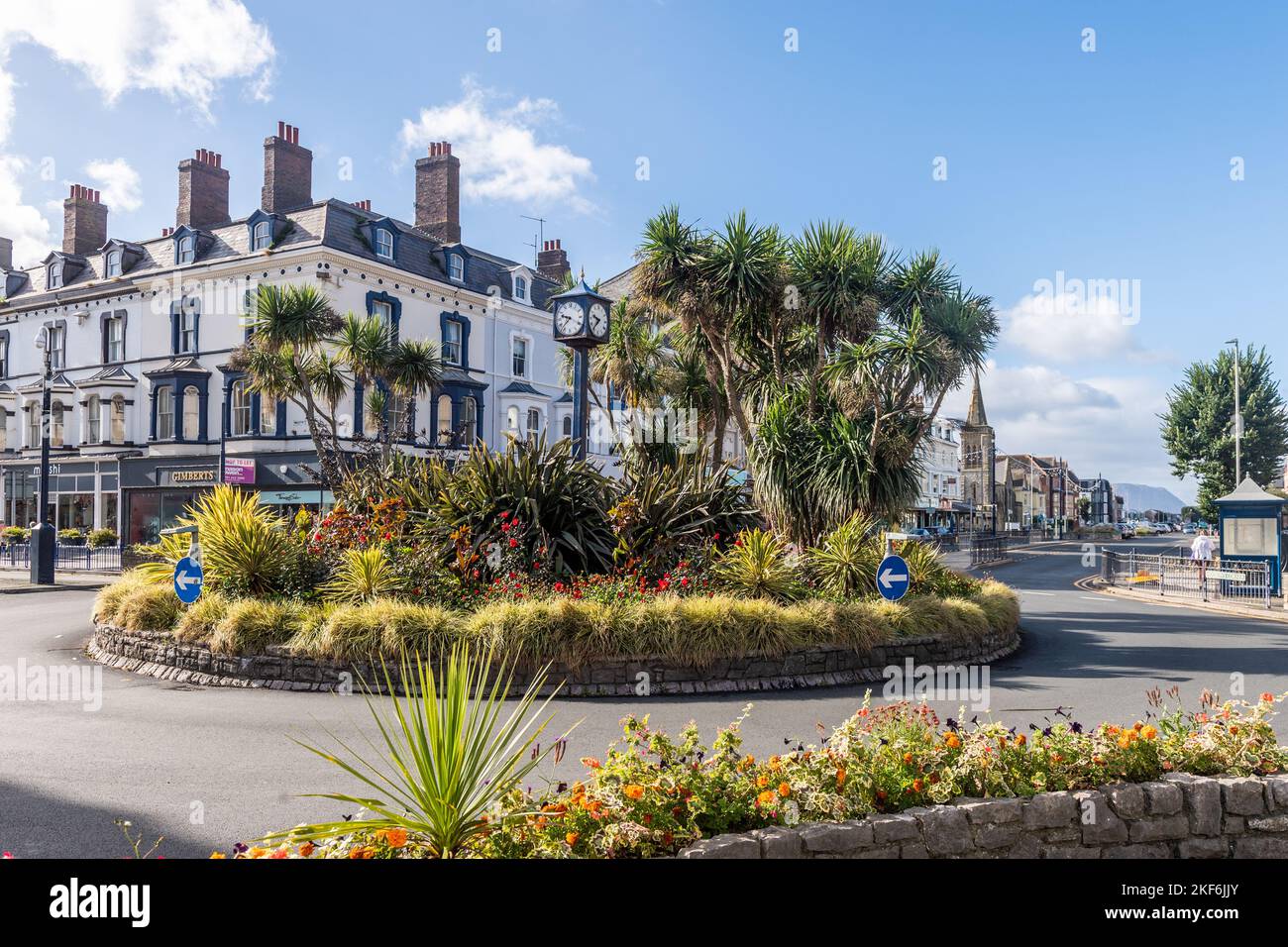 Floral roundabout and clock in the centre of the Victorian seaside resort of Llandudno, North Wales, UK. Stock Photo