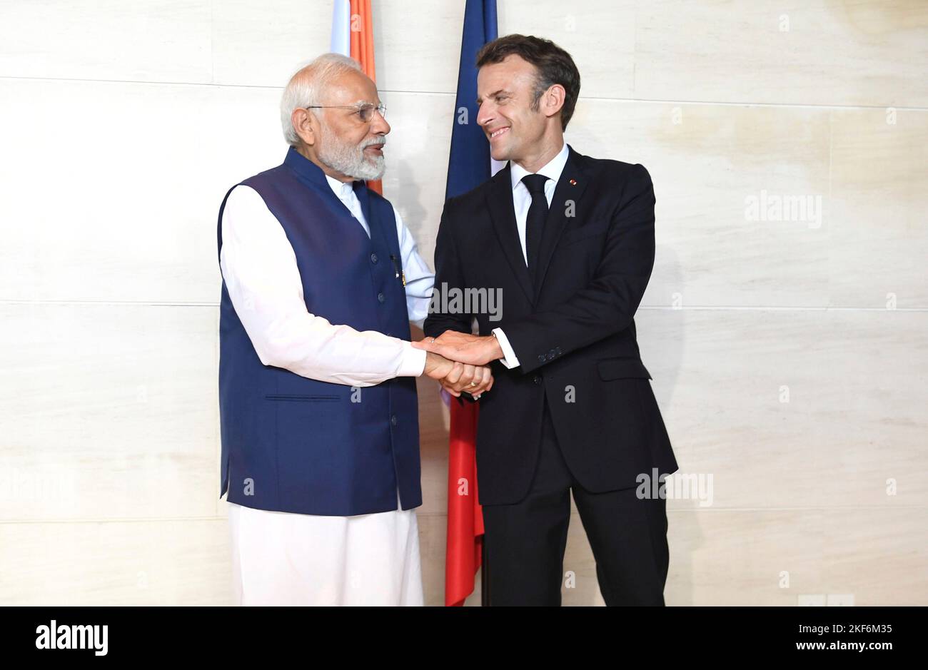 Nusa Dua, Indonesian. 16th Nov, 2022. Nusa Dua, Indonesian. 16 November, 2022. Indian Prime Minister Narendra Modi, right, greets French President Emmanuel Macron prior to their bilateral meeting on the sidelines of the G20 Leaders Summit, November 16, 2022, in Bali, Indonesia. Credit: Press Information Bureau/PIB Photo/Alamy Live News Stock Photo