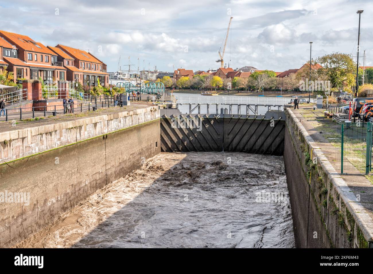 Scouring silt from the Junction Lock and Cumberland Basin in Bristol Docks, Bristol, United Kingdom Stock Photo