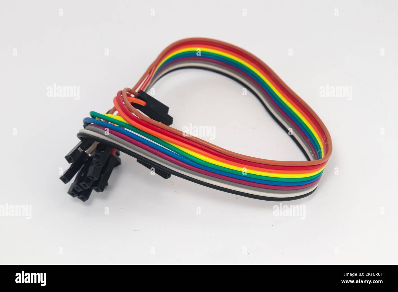 Rainbow cable with female to female connector as a jumper for DIY materials. Stock Photo