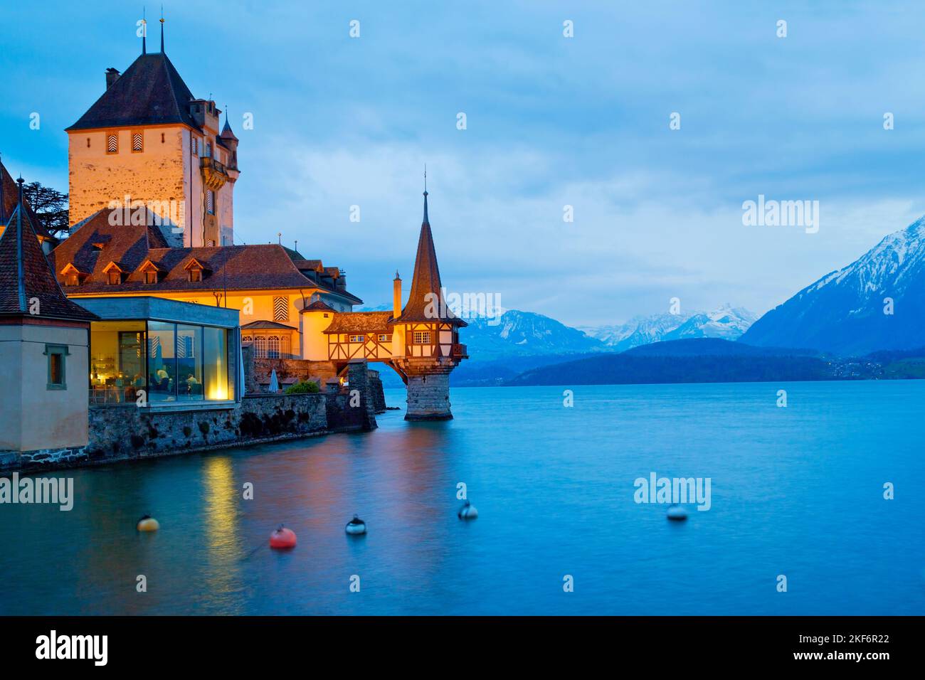 Oberhofen Castle during twilight, Lake Thun, Switzerland Stock Photo
