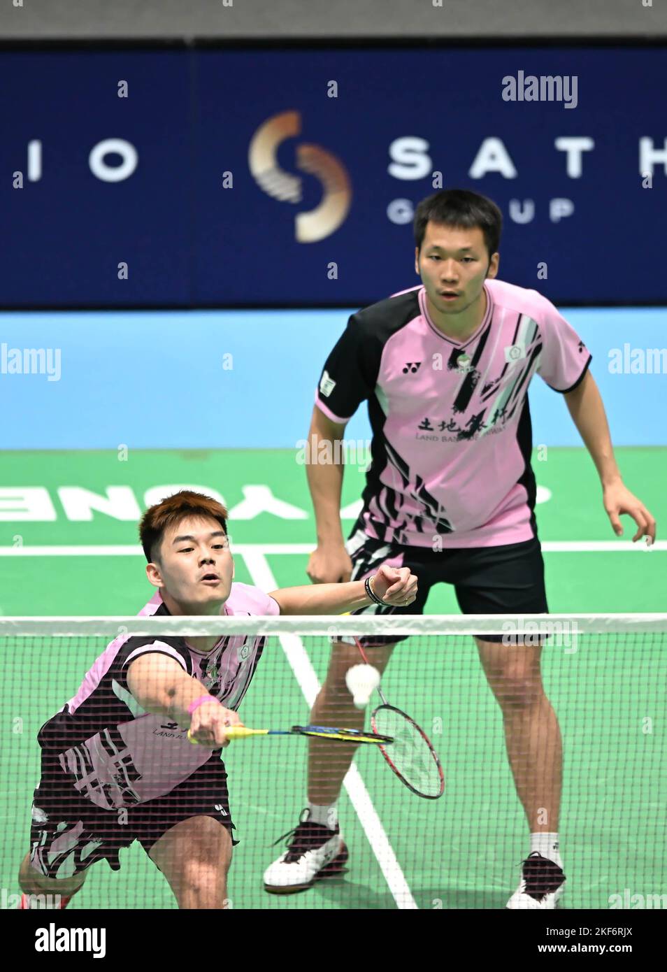 Lee Yang (back) and Wang Chi-Lin (front) of Chinese Taipei are seen in action during the 2022 SATHIO GROUP Australian Badminton Open Round of 32 Mens Double match against Su Ching Heng