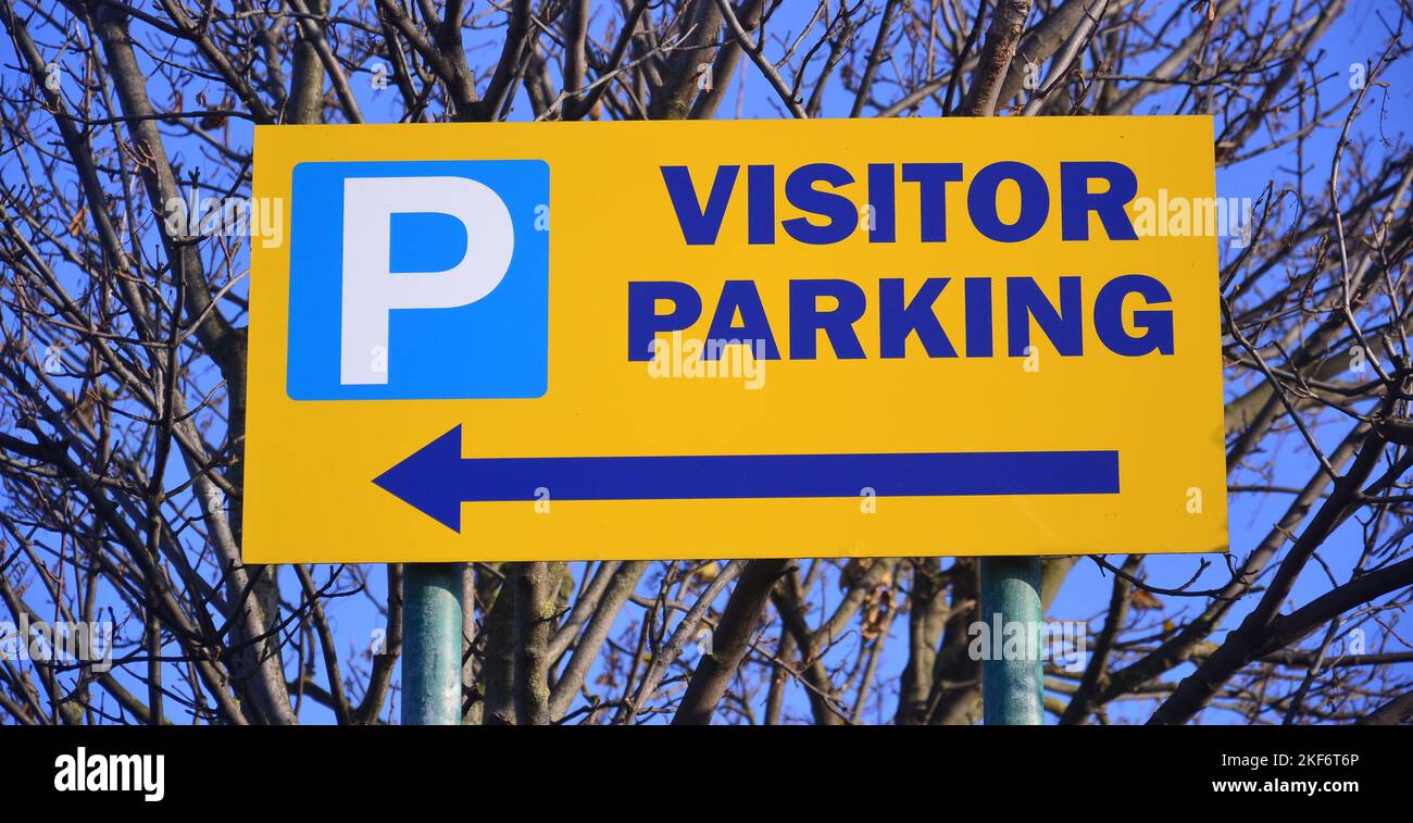 Sign "visitor parking " with an arrow Stock Photo Alamy