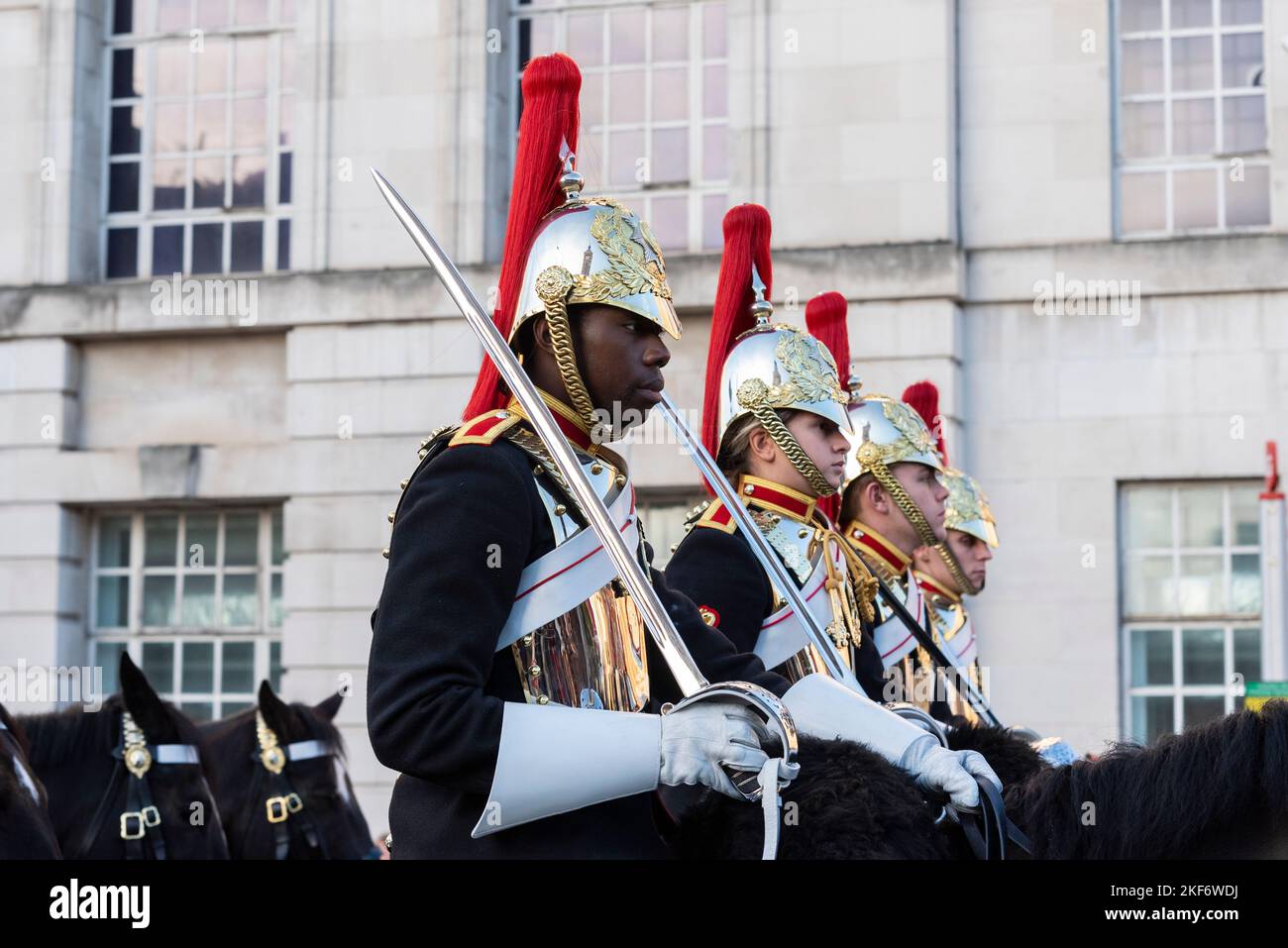 The Blues and Royals of the The Household Cavalry at the Lord Mayor's Show parade in the City of London, UK. Black male rider, with white riders Stock Photo