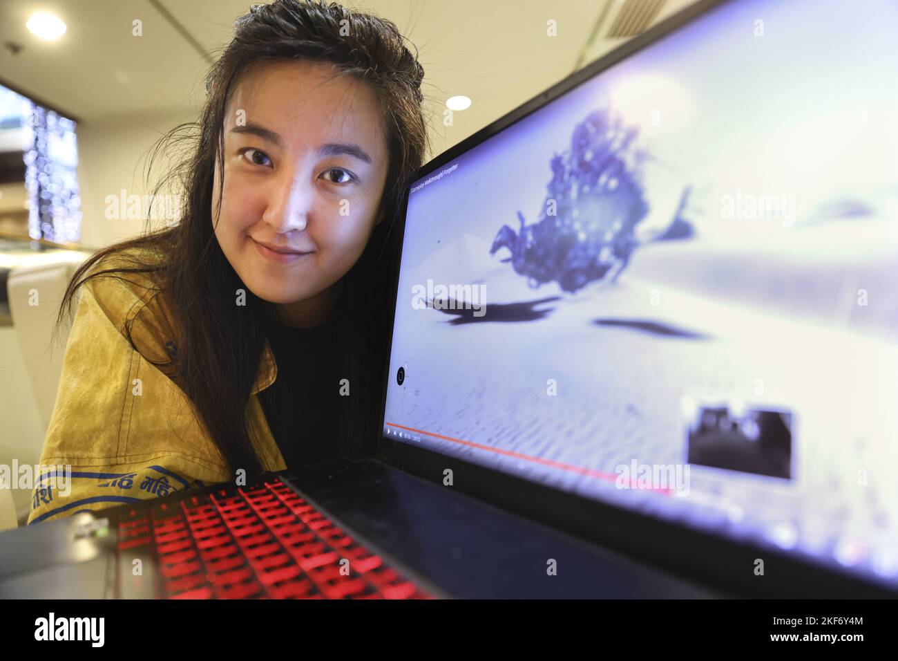 Allison Yang, a game developer, producer and curator HHamong many other hats she wears poise for a photograph  at Sha Tin.09NOV22 SCMP / K. Y. Cheng Stock Photo