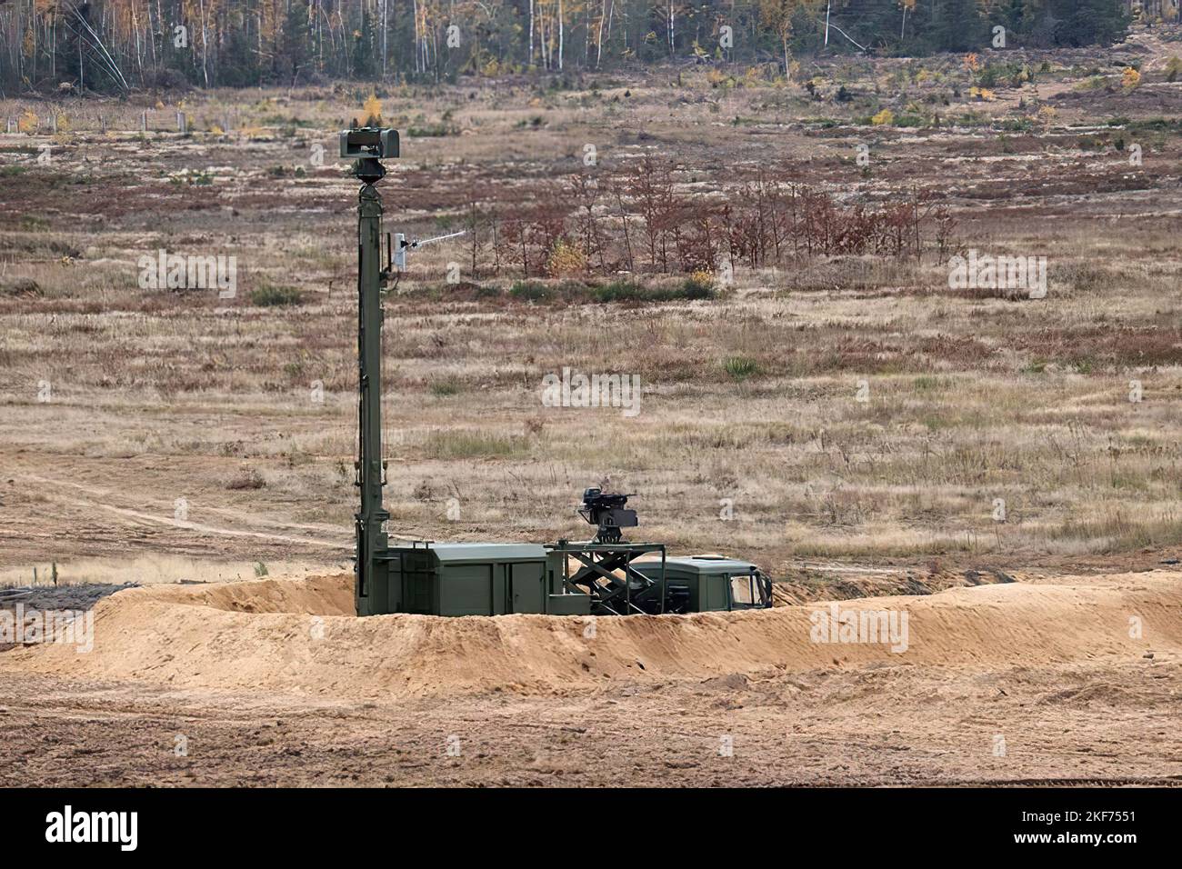 Tank with a periscope in a trench. Military exercises at the training