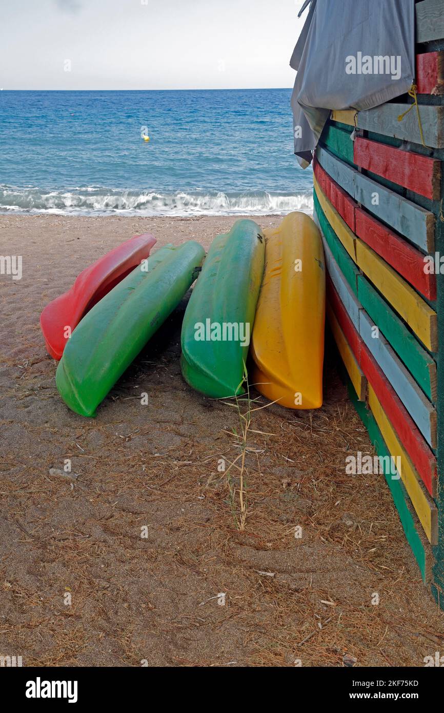 Water sports hut with kayaks / canoes. Bright colours. Anaxos beach, Lesbos, Greece.. October 2022. Autumn. Stock Photo
