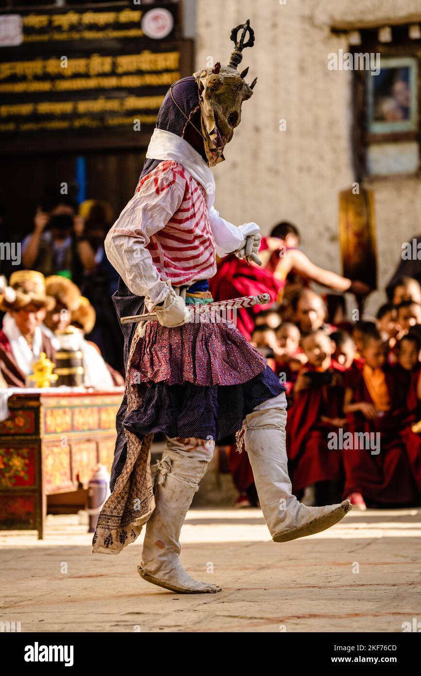 A Tibetan Buddhist in traditional demon ghost clothing in Ritual Dance ...