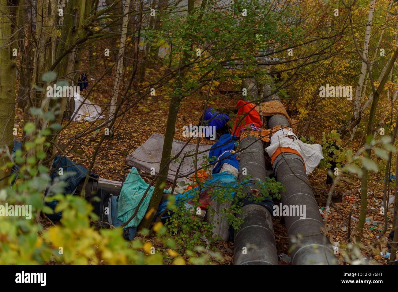 A small homeless camp on a district heating line Stock Photo