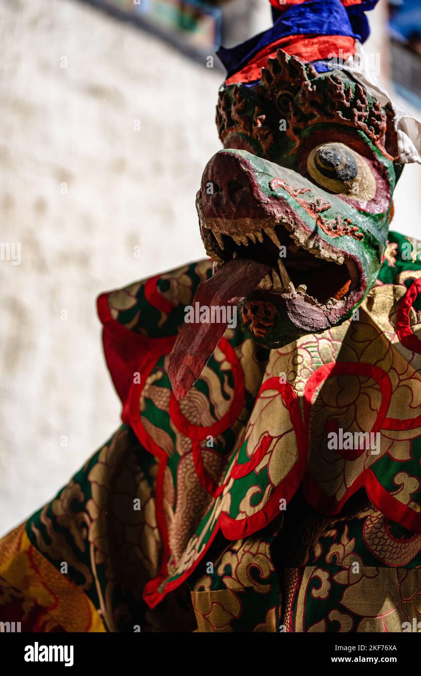 A Tibetan Buddhist in traditional demon ghost clothing in Ritual Dance ...