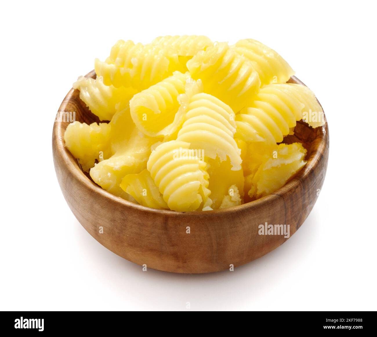 Ghee butter in wooden bowl isolated on white, Keto diet. Cooking oil ...