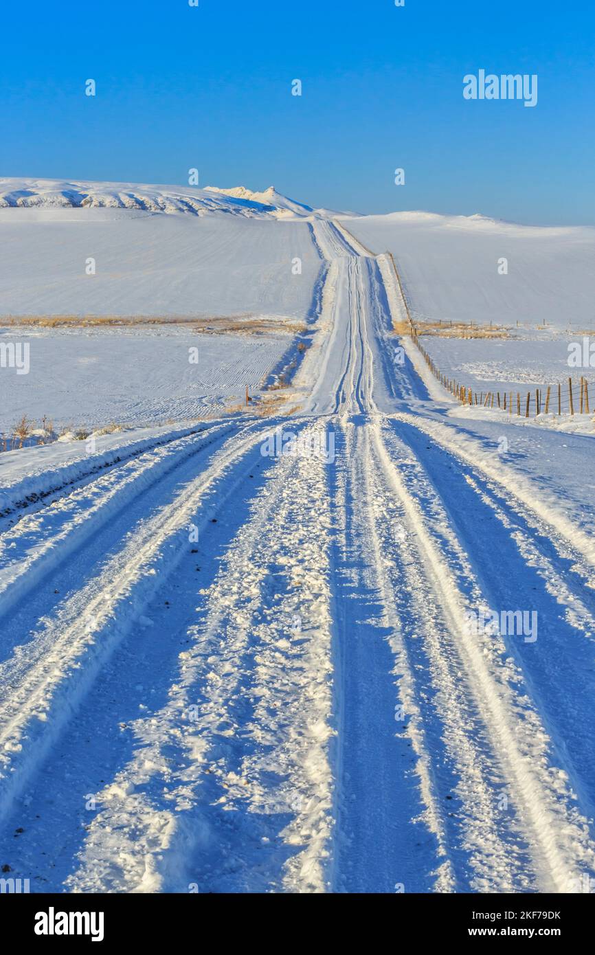 winter snow and backroad below shaw butte near simms, montana Stock