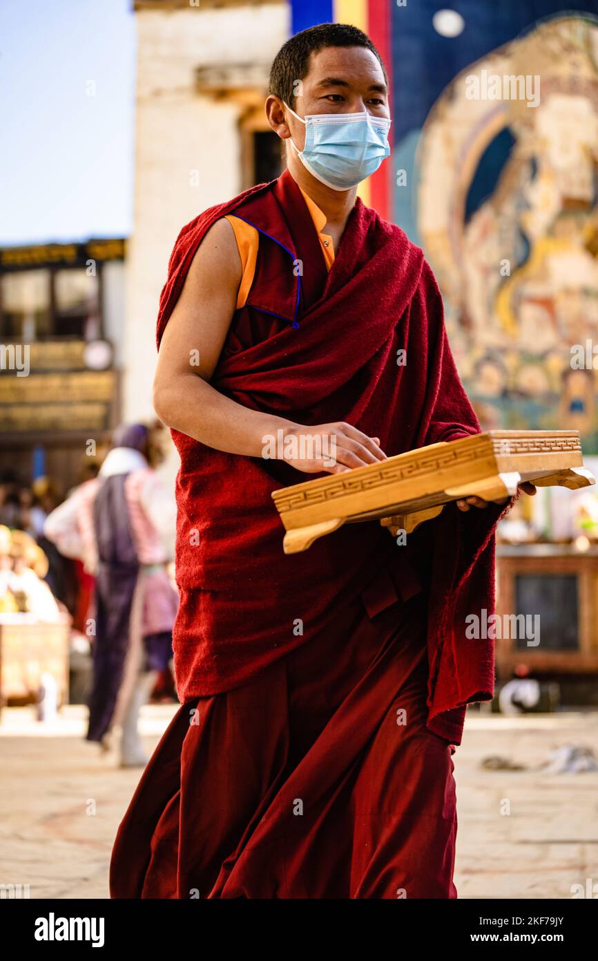 Young Tibetan Buddhist Monk at the ancient Tiji Festival in walled city