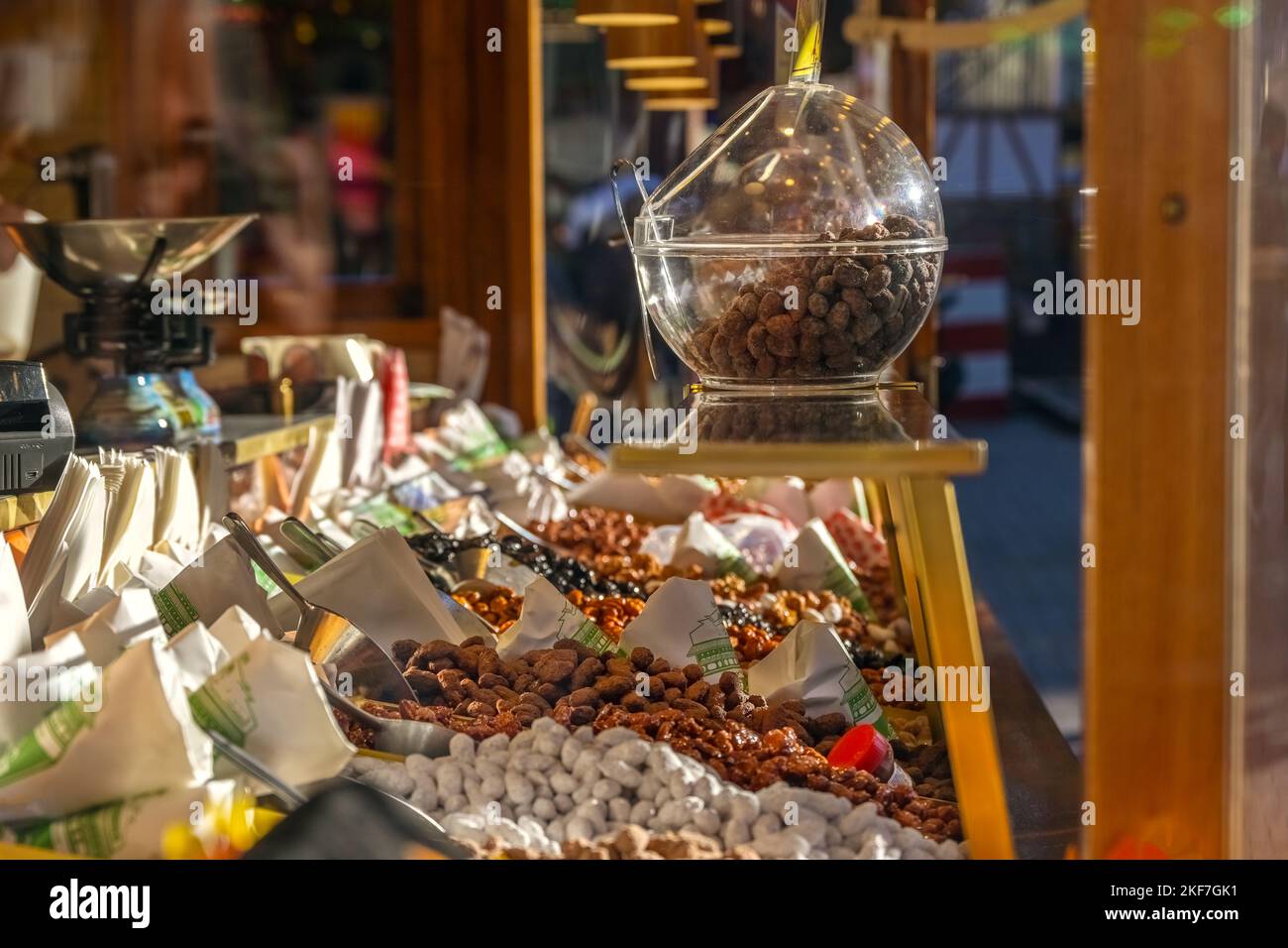 Stall with burnt almonds and other sweets at a traditional Christmas market, selected focus, narrow depth of field Stock Photo
