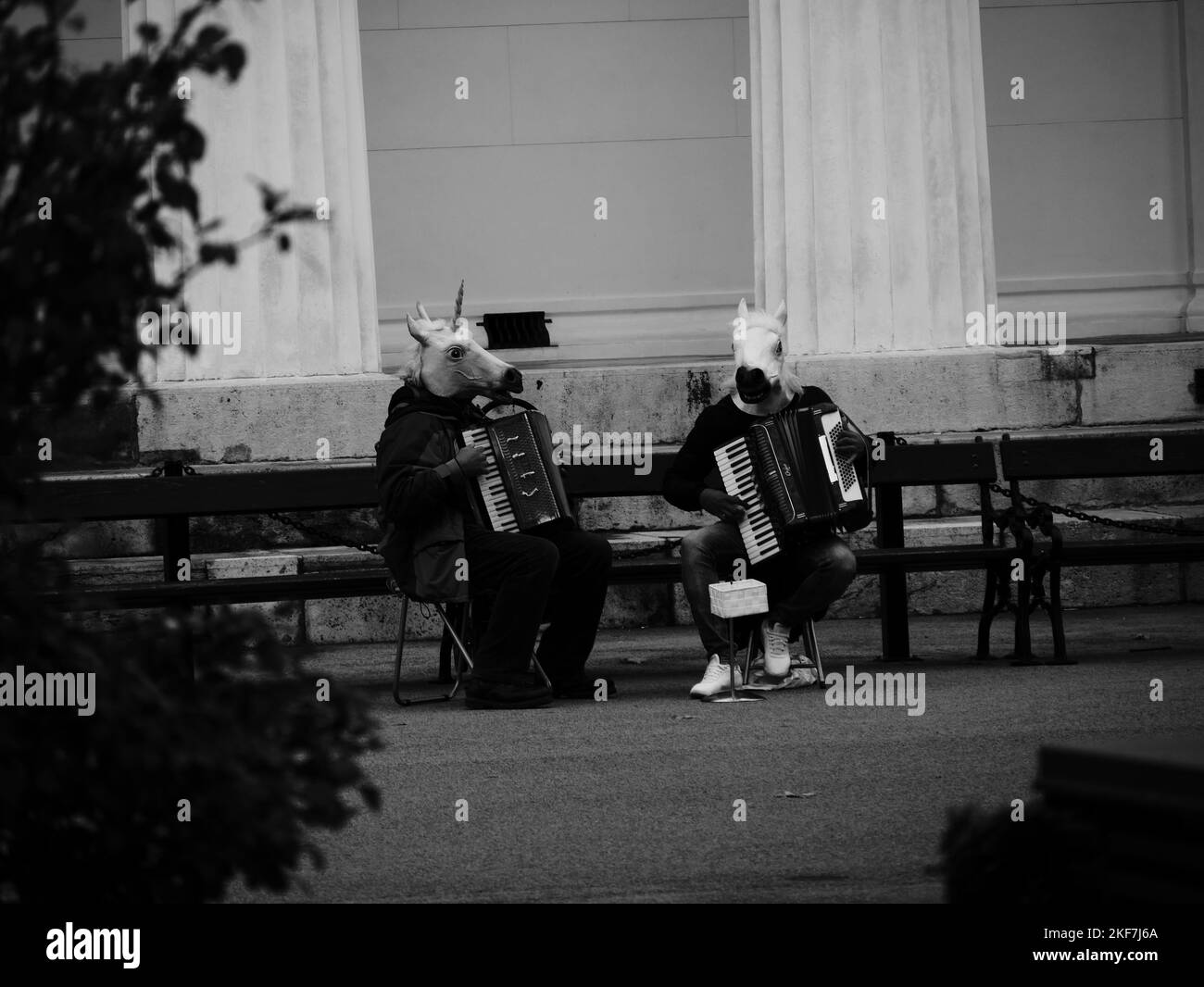 Musicians wearing masks Black and White Stock Photos & Images - Alamy