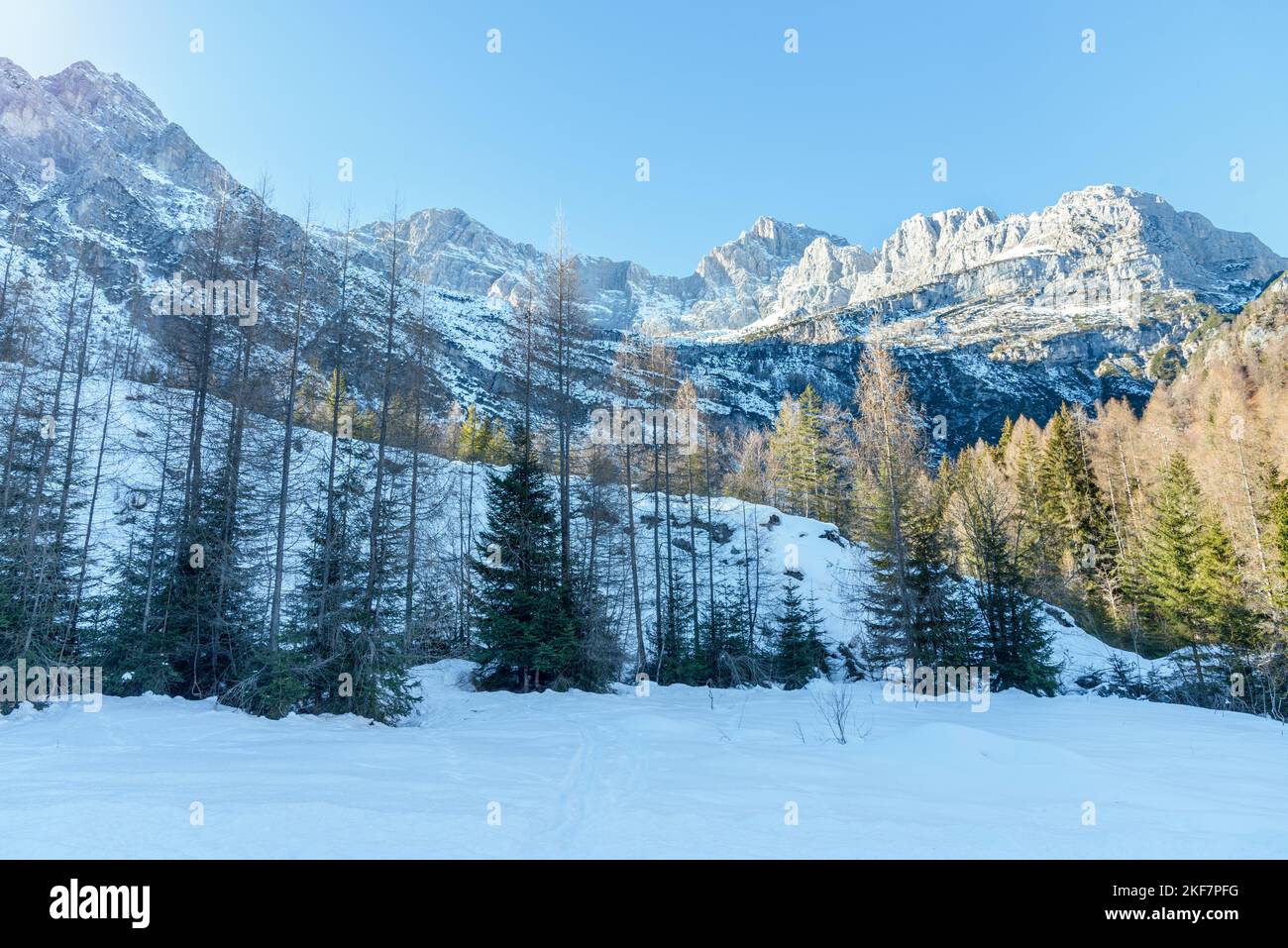Majestic snow covered mountain on a sunny winter day Stock Photo