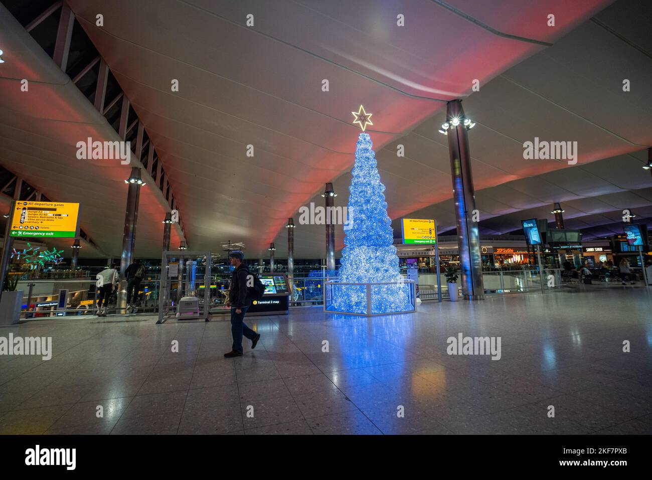 London UK. 16 November 2022. An illuminated christmas tree displayed at quiet Heathrow terminal