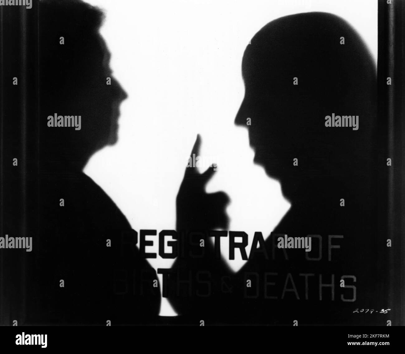 ALFRED HITCHCOCK in his cameo appearance as the Registrar of Births and Deaths in FAMILY PLOT 1976 director ALFRED HITCHCOCK novel Victor Canning screenplay Ernest Lehman music John Williams Alred J. Hitchcock Productions / Universal Pictures Stock Photo