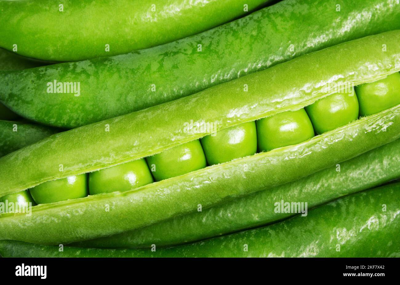 Green fresh peas and pea pods. Pea close up Stock Photo