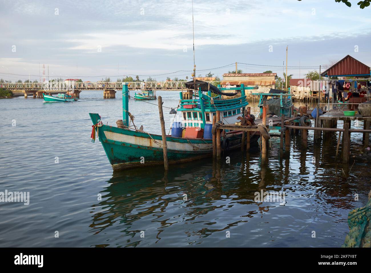 Fishing Boats on the river in Kampot Cambodia Stock Photo - Alamy