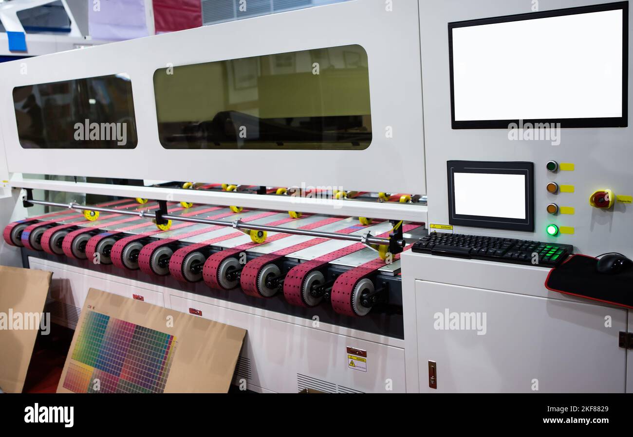 Corrugated and packaging digital printing machine. Printing industry. Stock Photo