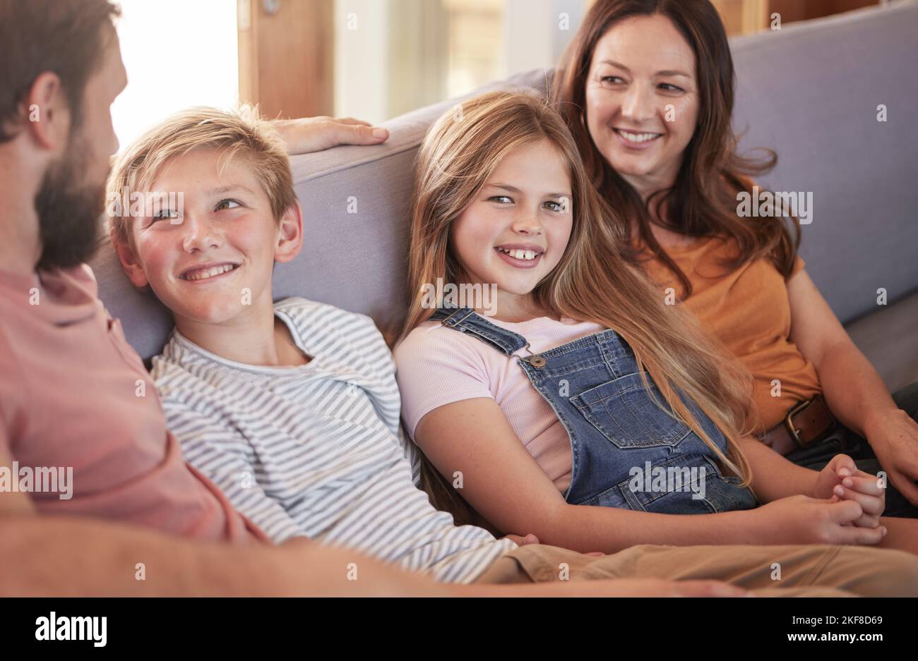 Relax, happy and smile with family on sofa for quality time, bonding ...