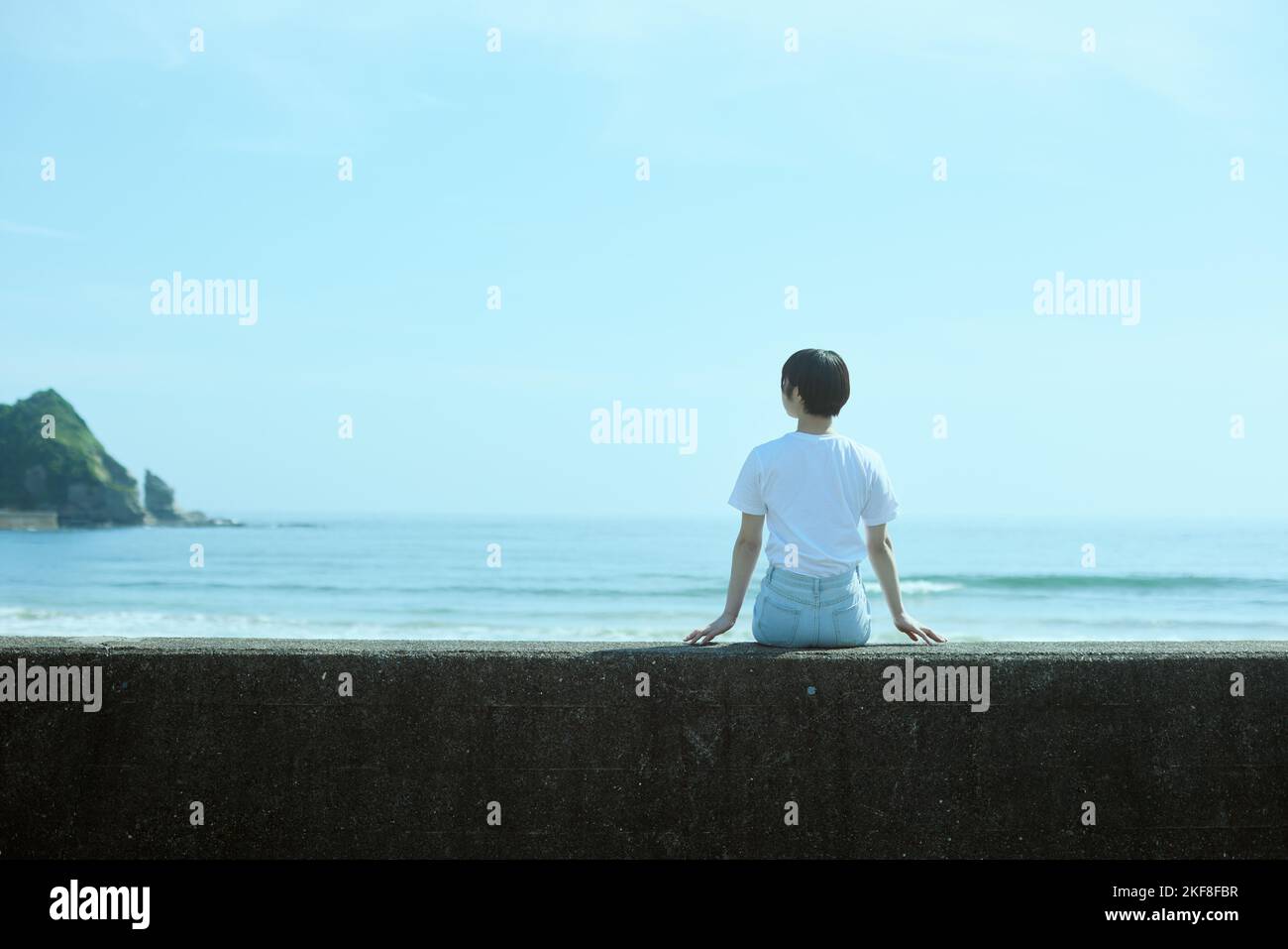 Young Japanese woman at the beach Stock Photo - Alamy