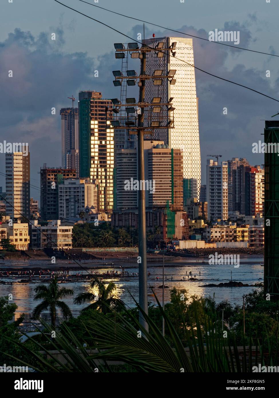 View of a New Dadar Beach and Skyscraper in Mumbai state Maharashtra India 09 25 2022 Stock Photo