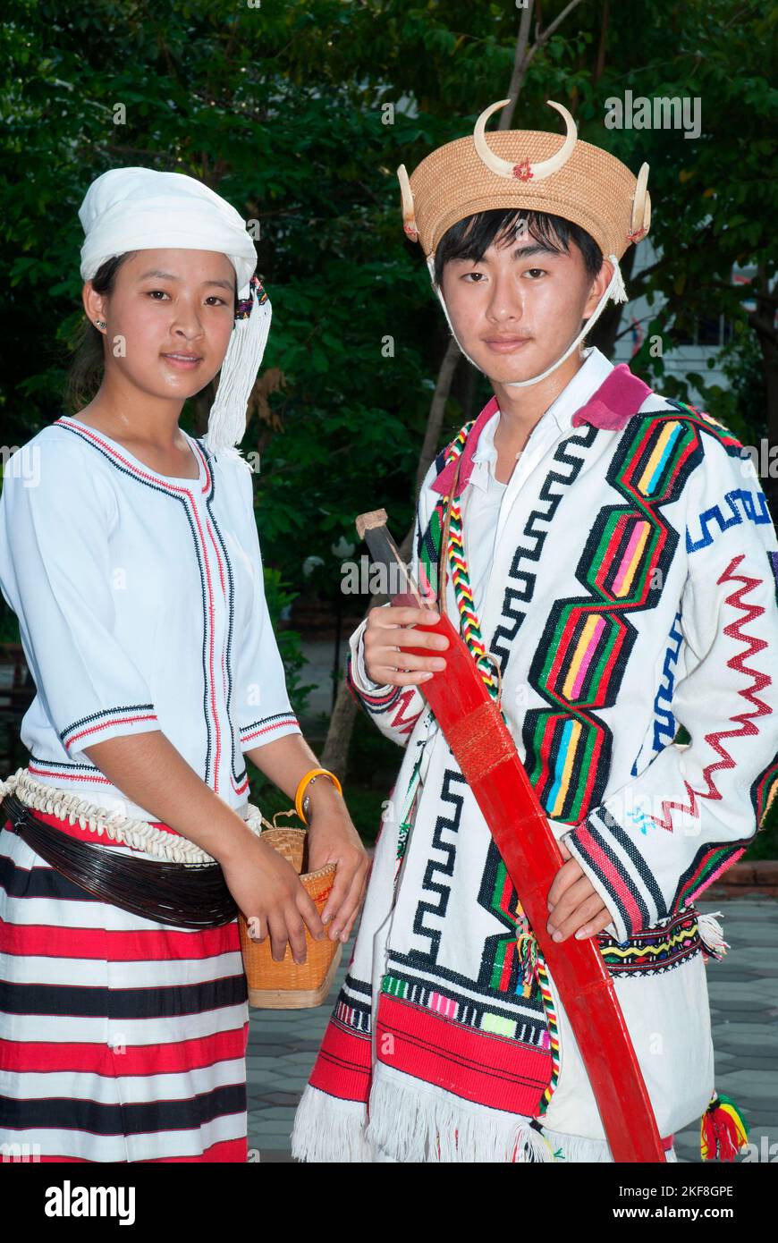 Ethnic Kachin male in traditional attire wear traditional rattan hats ...