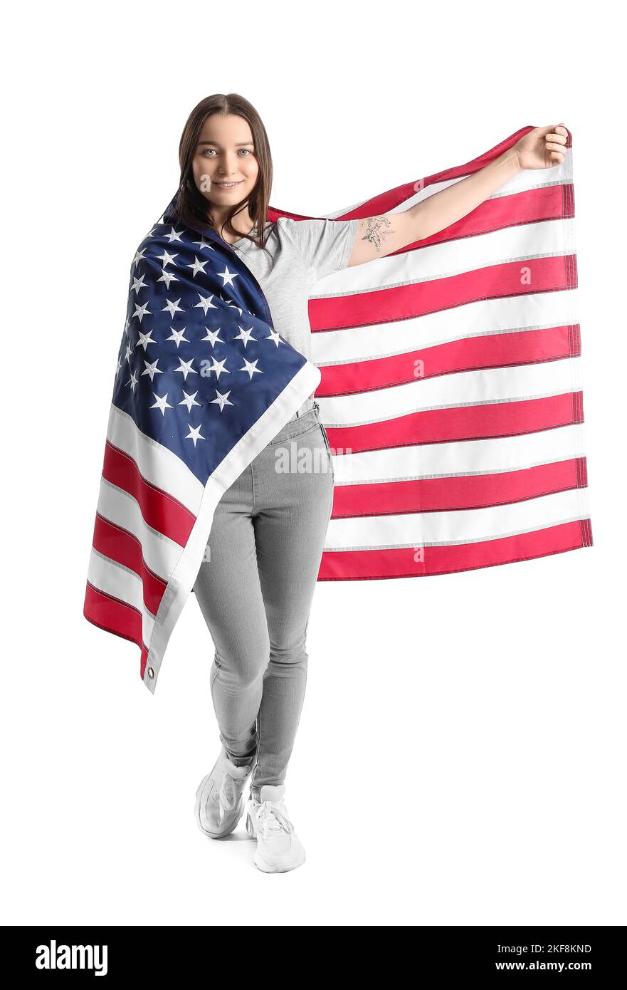 Young woman holding USA flag on white background Stock Photo - Alamy