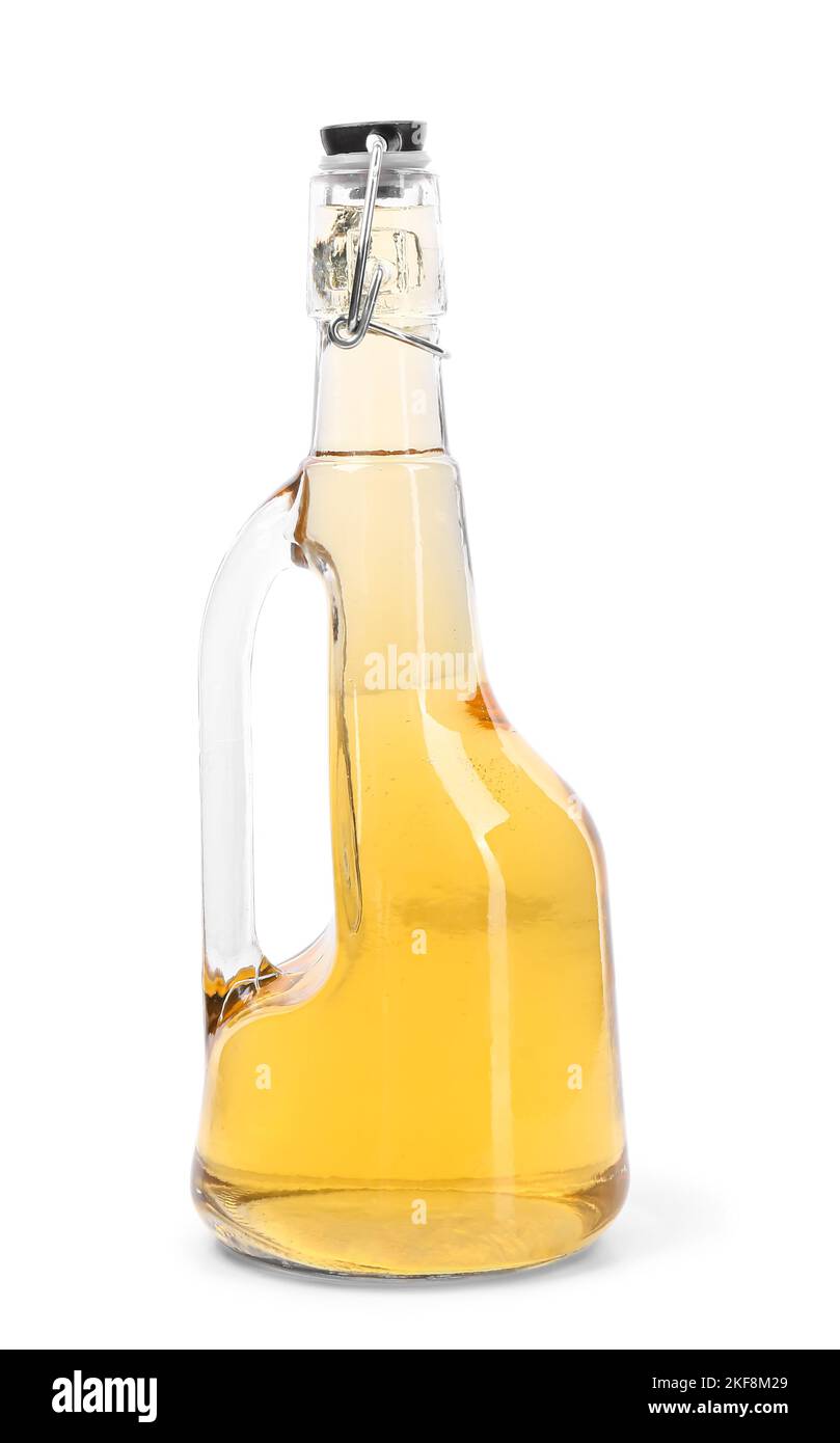 Glass bottle of apple cider vinegar isolated on white background Stock