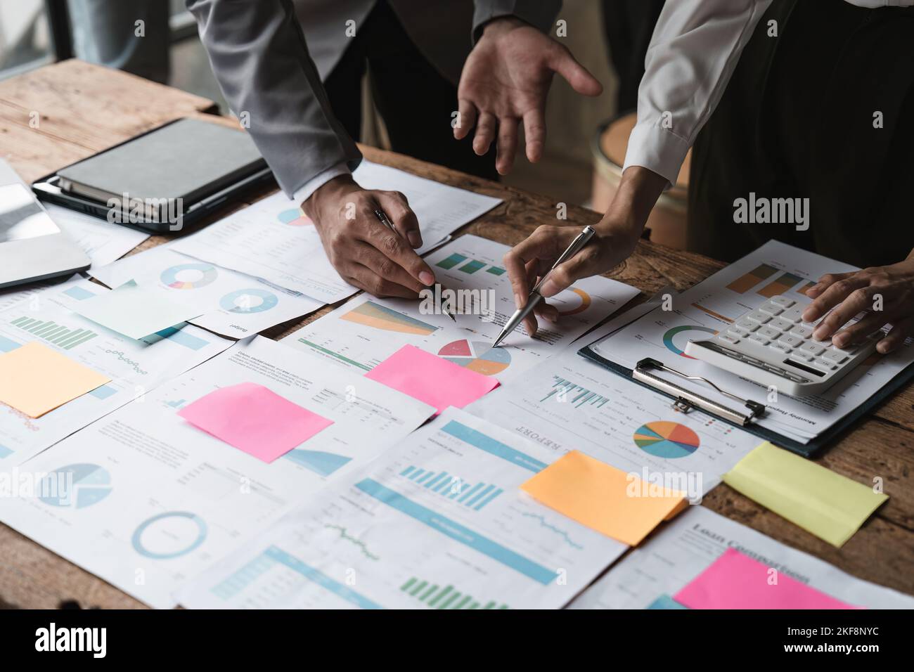 Startup business meeting to analyze and discuss the situation on the financial report in the meeting room. Investment Consultant, Financial advisor Stock Photo